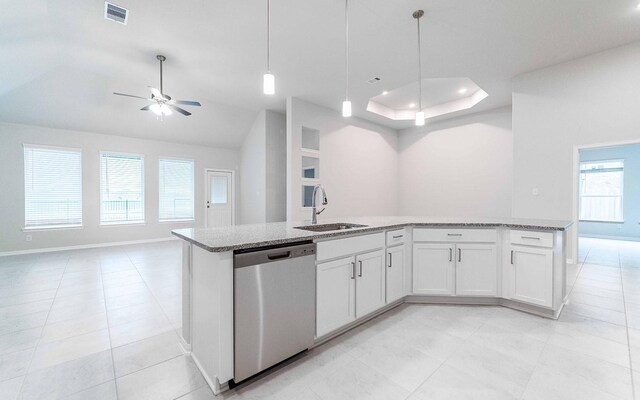 331 Riesling Dr, Alvin, TX 77511 - kitchen with dishwasher, a sink, open floor plan, light stone counters, and lofted ceiling