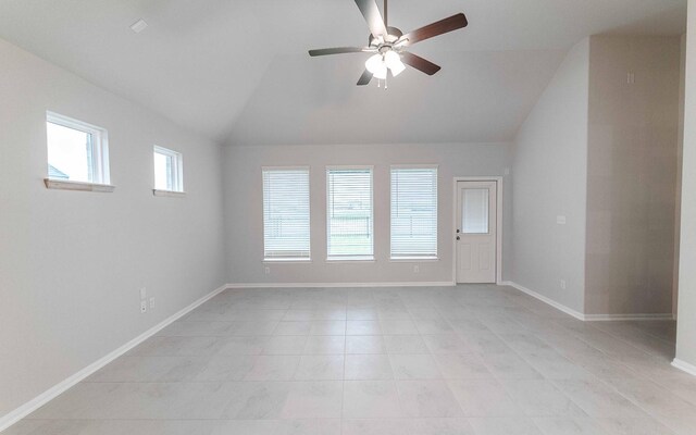 331 Riesling Dr, Alvin, TX 77511 - unfurnished room with vaulted ceiling, ceiling fan, light tile patterned floors, and baseboards