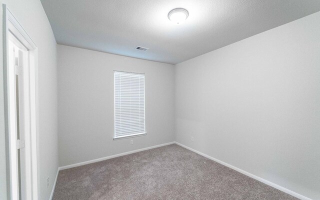 331 Riesling Dr, Alvin, TX 77511 - unfurnished room with carpet flooring and baseboards