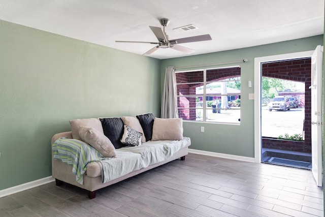 4506 Boicewood St, Houston, TX 77016 - living area with visible vents, baseboards, wood finished floors, and ceiling fan