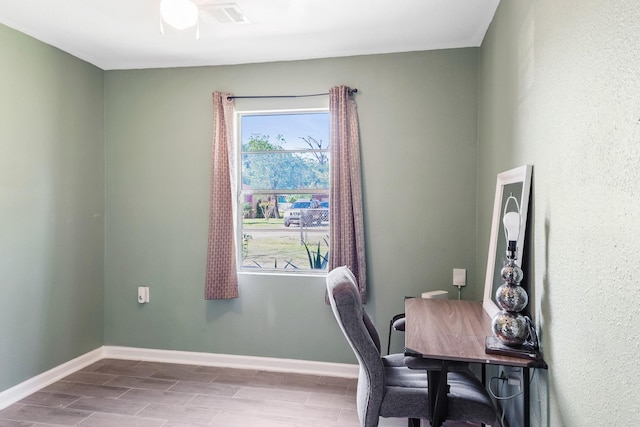 4506 Boicewood St, Houston, TX 77016 - office space featuring wood tiled floor, visible vents, baseboards, and ceiling fan