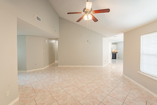 12626 Lacey Crest Dr, Houston, TX 77070 - unfurnished room featuring light tile patterned flooring, baseboards, visible vents, ceiling fan, and high vaulted ceiling