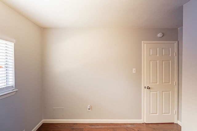 12626 Lacey Crest Dr, Houston, TX 77070 - spare room with baseboards and wood finished floors