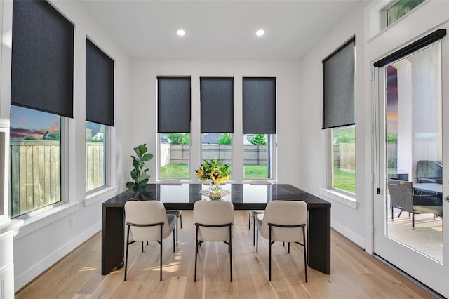 dining space featuring recessed lighting, baseboards, and light wood-style floors