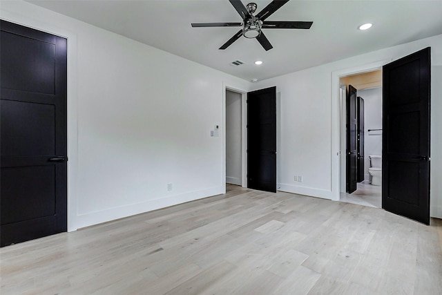 1907 Lauderdale St, Houston, TX 77030 - unfurnished bedroom with recessed lighting, connected bathroom, light wood-type flooring, baseboards, and visible vents