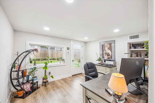 office featuring recessed lighting, wood finished floors, visible vents, and baseboards