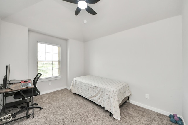 bedroom featuring baseboards, vaulted ceiling, carpet flooring, and ceiling fan