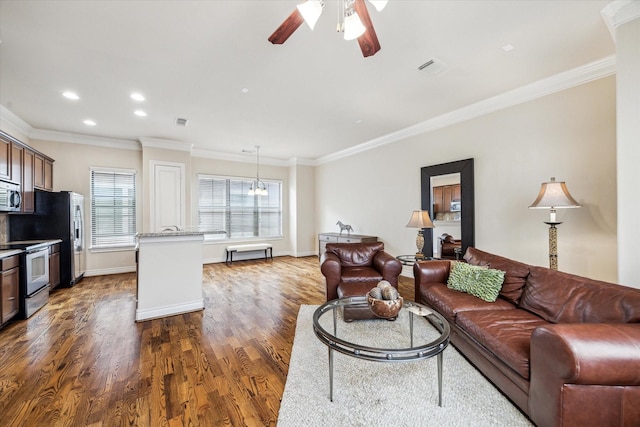 living area featuring a ceiling fan, dark wood finished floors, and ornamental molding