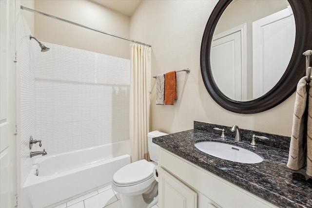 full bath featuring vanity, tile patterned flooring, shower / bath combo, and toilet