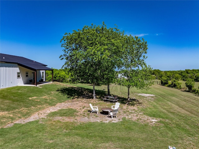 108 High Meadow Ct, Schulenburg, TX 78956 - view of yard featuring an outdoor fire pit and a patio