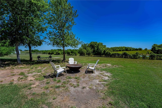 108 High Meadow Ct, Schulenburg, TX 78956 - view of yard with a fire pit and a rural view