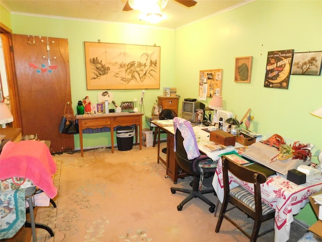 office featuring a ceiling fan and ornamental molding