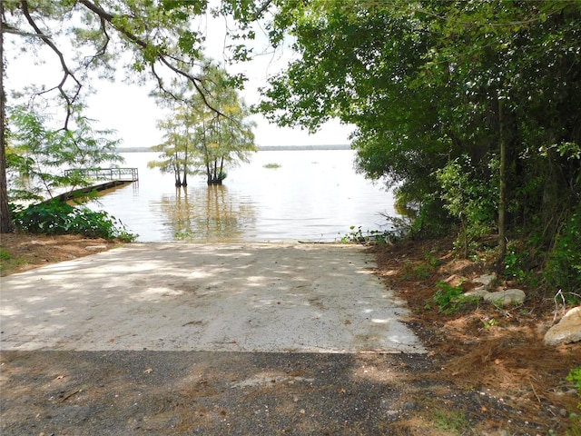 property view of water featuring a dock