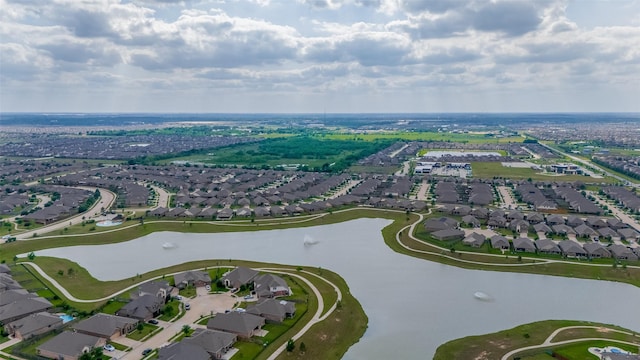 aerial view featuring a residential view and a water view