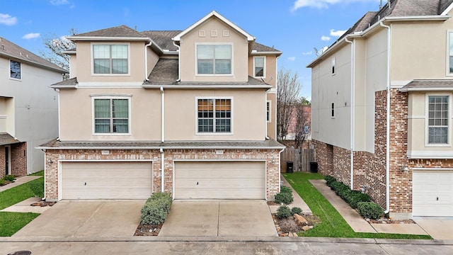 7818 Stoneyway Dr, Houston, TX 77040 - multi unit property with a garage, brick siding, stucco siding, and driveway
