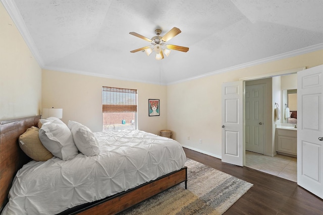 7818 Stoneyway Dr, Houston, TX 77040 - bedroom with lofted ceiling, ceiling fan, wood finished floors, and ornamental molding