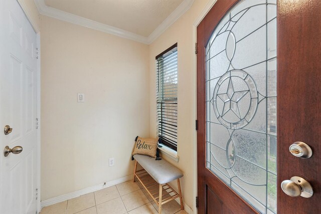 7818 Stoneyway Dr, Houston, TX 77040 - entrance foyer featuring light tile patterned flooring, crown molding, and baseboards
