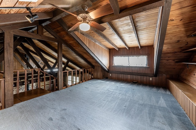 unfinished attic with an upstairs landing