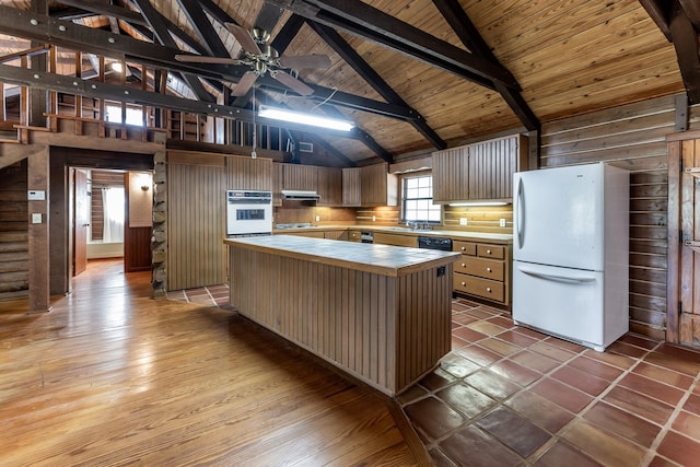 kitchen with high vaulted ceiling, a ceiling fan, wood counters, white appliances, and ventilation hood