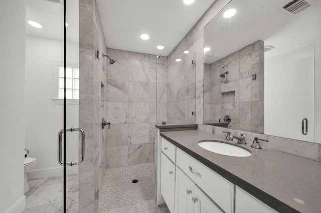 full bath featuring a shower stall, marble finish floor, toilet, and visible vents
