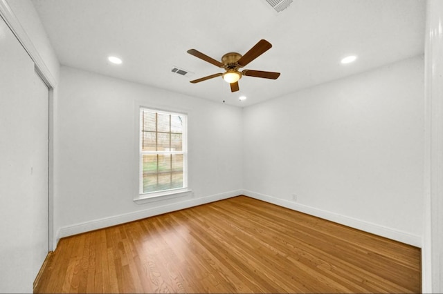 interior space featuring recessed lighting, visible vents, baseboards, light wood-style flooring, and ceiling fan