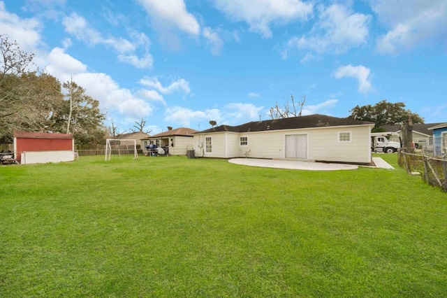 back of house with a patio area and fence