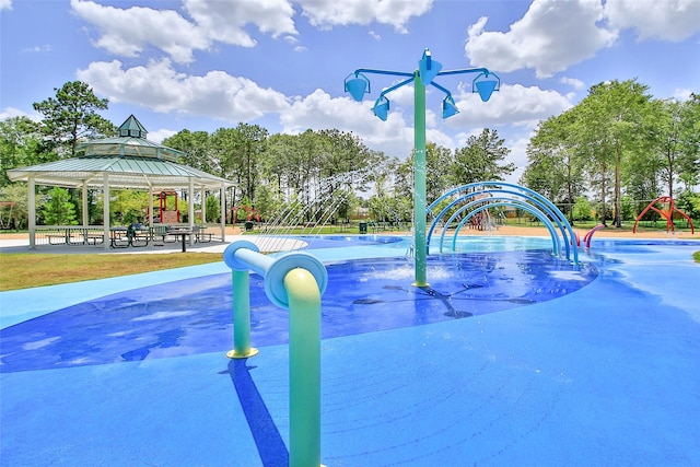 view of home's community featuring a gazebo and playground community