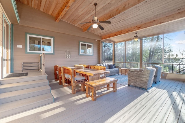 1222 Harts Creek Rd, Trinity, TX 75862 - sunroom featuring ceiling fan, an outdoor hangout area, beam ceiling, and plenty of natural light