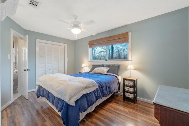 1222 Harts Creek Rd, Trinity, TX 75862 - bedroom with wood finished floors, a closet, ceiling fan, baseboards, and visible vents
