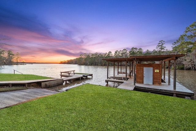 1222 Harts Creek Rd, Trinity, TX 75862 - dock area featuring a lawn and a water view