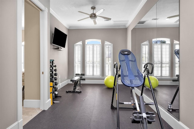 workout room with visible vents, crown molding, and ceiling fan