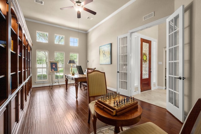 24636 Hosford Meadows Dr, Porter, TX 77365 - office with wood-type flooring, visible vents, crown molding, and french doors