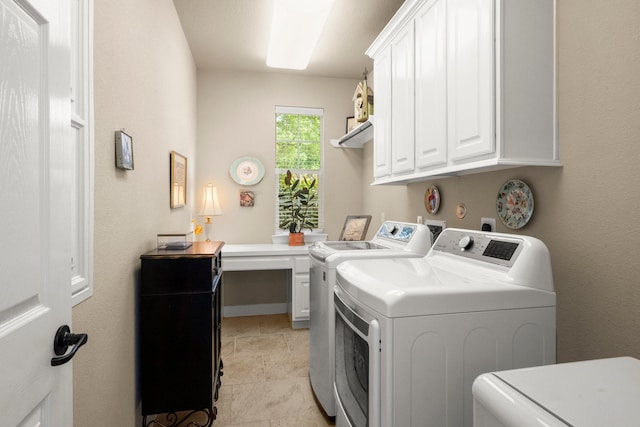 24636 Hosford Meadows Dr, Porter, TX 77365 - laundry area with cabinet space and washer and clothes dryer