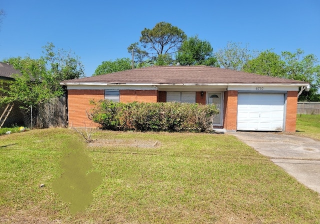 6710 Fairwood Rd, Hitchcock, TX 77563 - ranch-style home with a garage, fence, a front yard, and concrete driveway