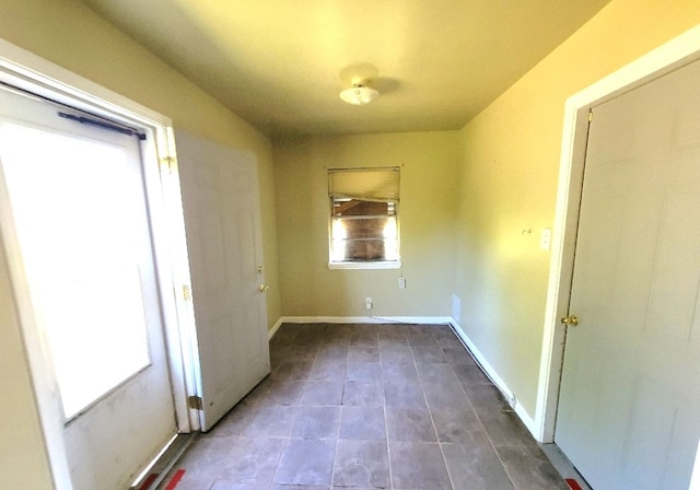 6710 Fairwood Rd, Hitchcock, TX 77563 - tiled spare room with baseboards