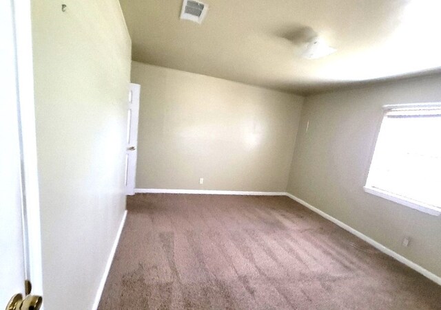 6710 Fairwood Rd, Hitchcock, TX 77563 - empty room with baseboards, visible vents, and carpet