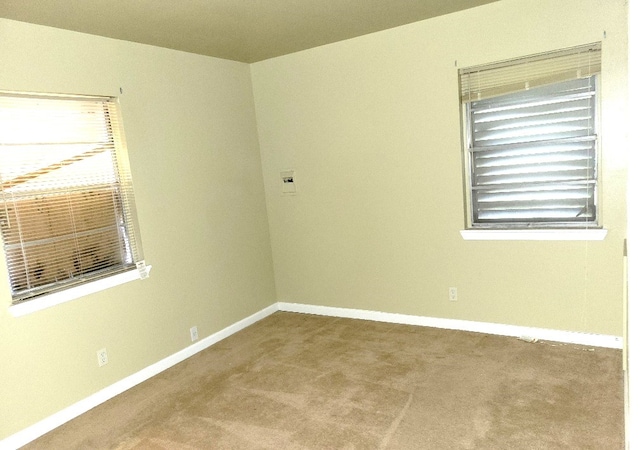 6710 Fairwood Rd, Hitchcock, TX 77563 - spare room with baseboards and carpet