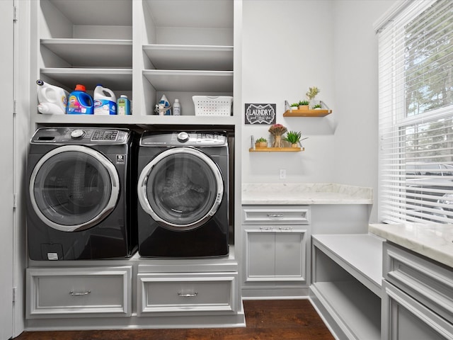 10539 Crestwater Cir, Magnolia, TX 77354 - washroom with separate washer and dryer and dark wood-style flooring