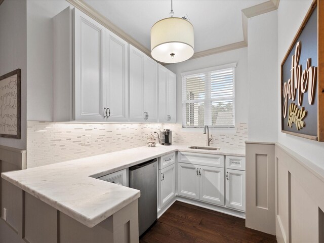 10539 Crestwater Cir, Magnolia, TX 77354 - kitchen with a sink, white cabinetry, tasteful backsplash, and light countertops