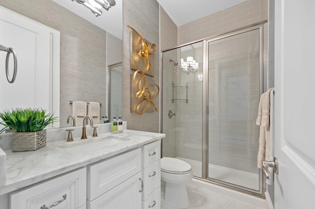 10539 Crestwater Cir, Magnolia, TX 77354 - full bath featuring a shower stall, toilet, vanity, and marble finish flooring