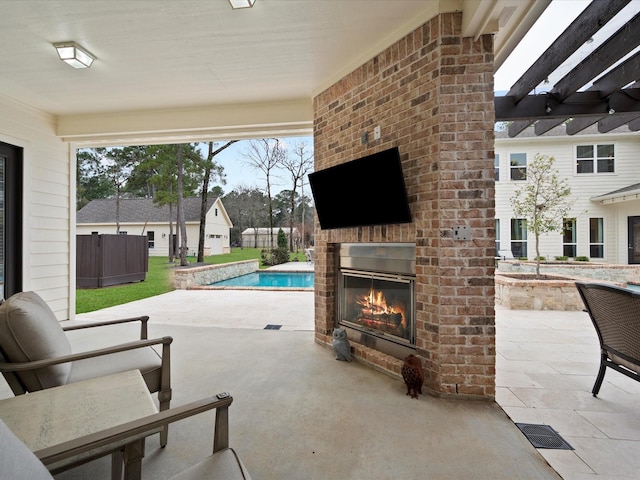 10539 Crestwater Cir, Magnolia, TX 77354 - view of patio / terrace featuring an outdoor brick fireplace
