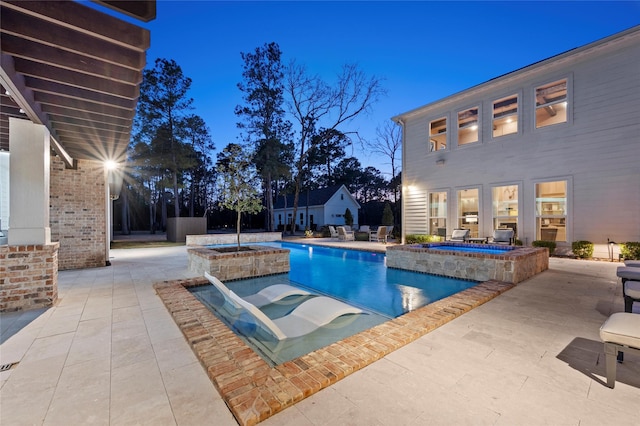 10539 Crestwater Cir, Magnolia, TX 77354 - view of swimming pool with a pool with connected hot tub and a patio