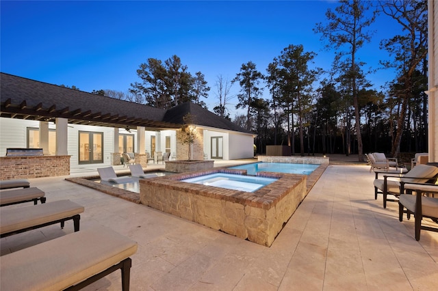 10539 Crestwater Cir, Magnolia, TX 77354 - swimming pool featuring french doors, an in-ground hot tub, a patio, and area for grilling