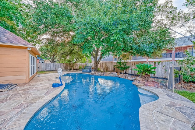 13710 Bayou Parkway Ct, Houston, TX 77077 - view of swimming pool with a fenced backyard and a patio area