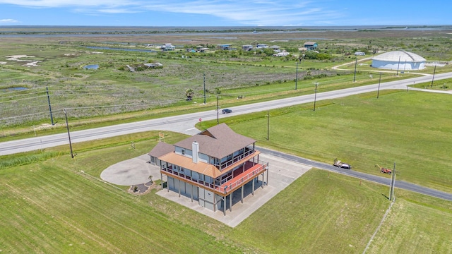 birds eye view of property featuring a rural view
