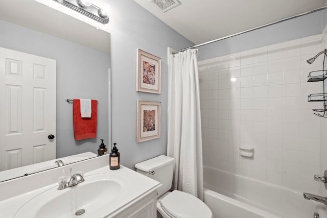 full bath with shower / tub combo, toilet, visible vents, and vanity