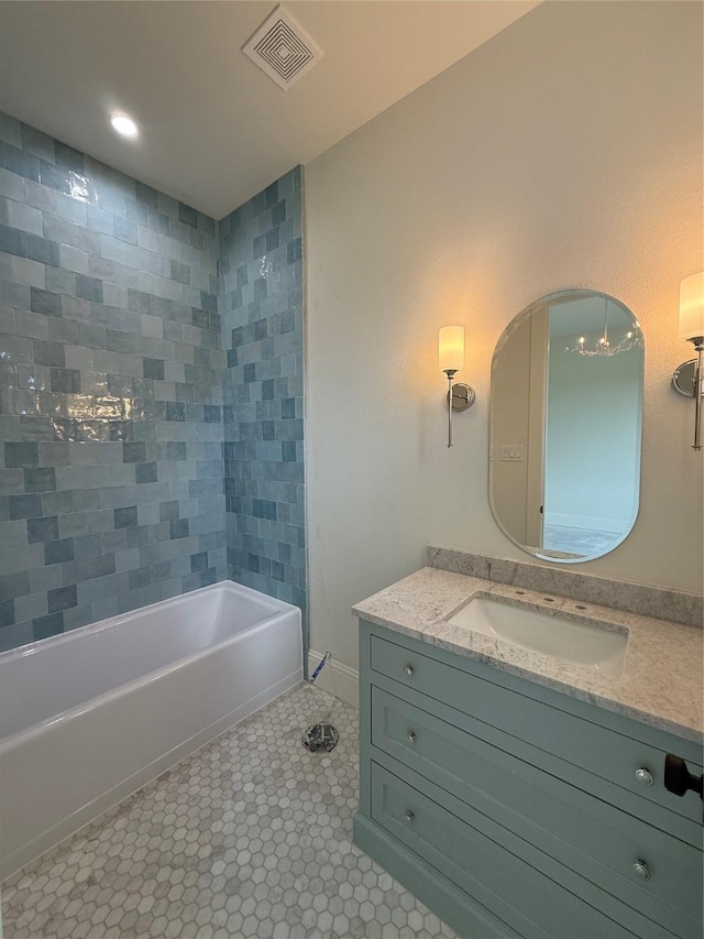 15420 Highlander Ct, Montgomery, TX 77356 - bathroom with vanity, tile patterned flooring, bathing tub / shower combination, and baseboards
