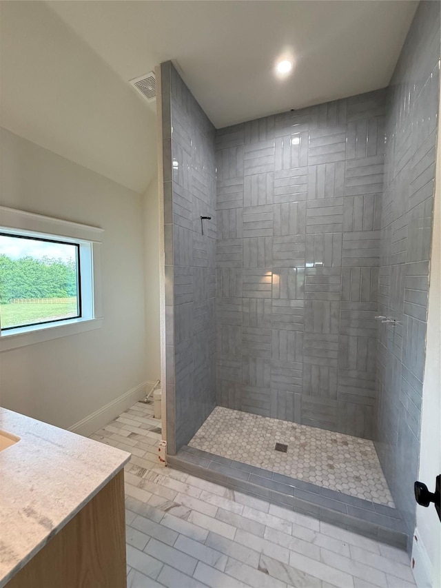 15420 Highlander Ct, Montgomery, TX 77356 - full bath featuring tiled shower, baseboards, and vanity