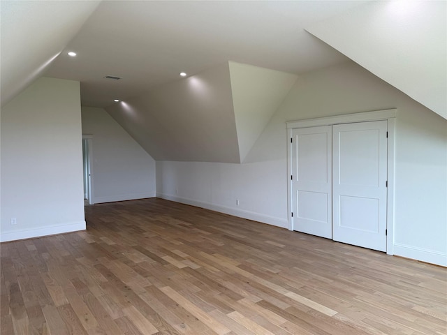 15420 Highlander Ct, Montgomery, TX 77356 - bonus room with lofted ceiling, light wood-style flooring, baseboards, and recessed lighting
