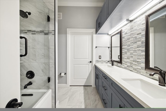 bathroom featuring bathtub / shower combination, marble finish floor, a sink, and double vanity